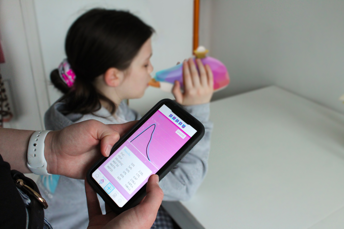 9 - A spirometry test being performed while the parent uses the app/Keith Fitzsimons
