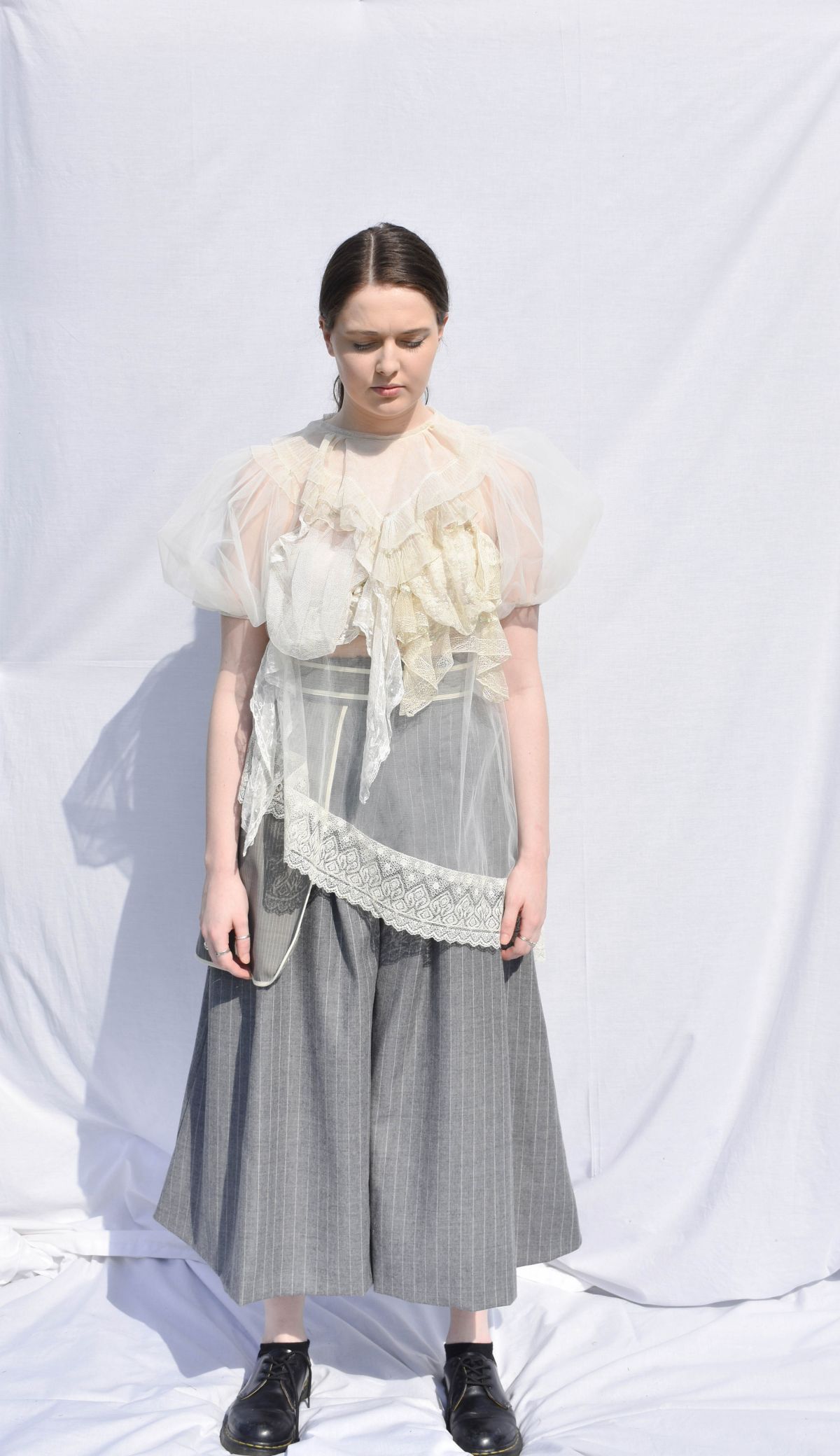 -Every Grace and Blessing You Need - Outfit 1; Underlayer, suiting wool trousers with large outer pocket detail, and vintage lace pieces with bridal tulle.