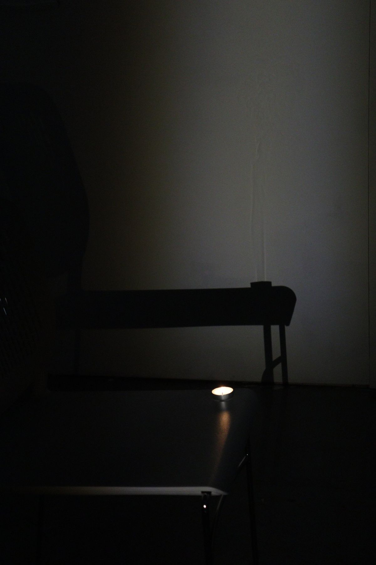 Movement of heated air revealed in the shadow of a candle