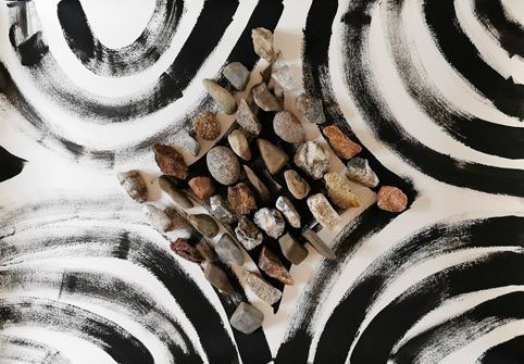 10.	Interstice and Calendar stones.jpg. gesso, carborundum powder  and Indian ink on paper, with 40 stones from Quarantine calendar. 108 cms x 76 cms.